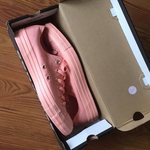 Converse shoes coral in color